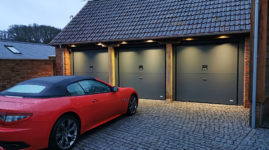 New triple garage doors installation